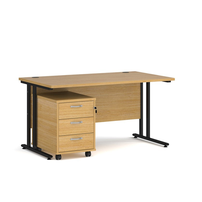 A Oak  finish desk with a 3 drawer pedestal bundle on a white background