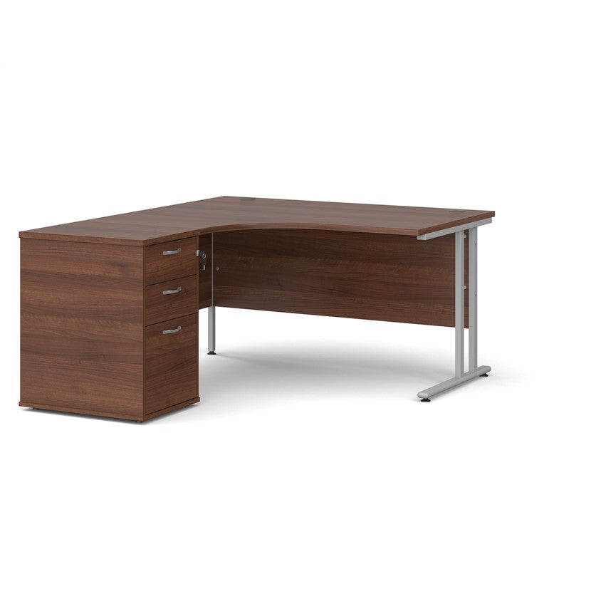 A left-hand corner desk with a cantilever frame and a beige melamine desktop, featuring a pedestal with two drawers.