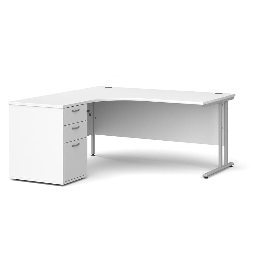 A left-hand corner desk with a cantilever frame and a White  melamine desktop, featuring a pedestal with two drawers.
