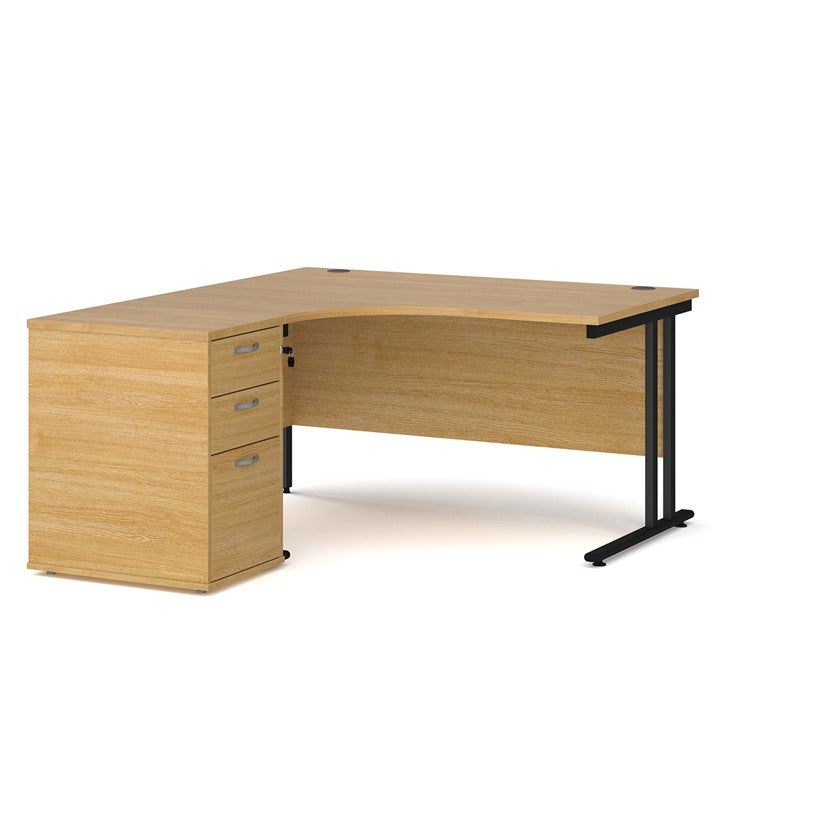 A left-hand corner desk with a black cantilever frame and a beige melamine desktop, featuring a pedestal with two drawers.