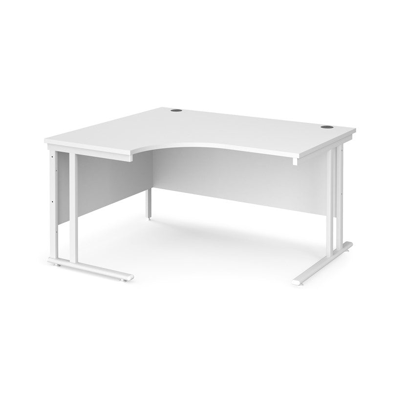A left hand desk in white finish with white metal legs. 