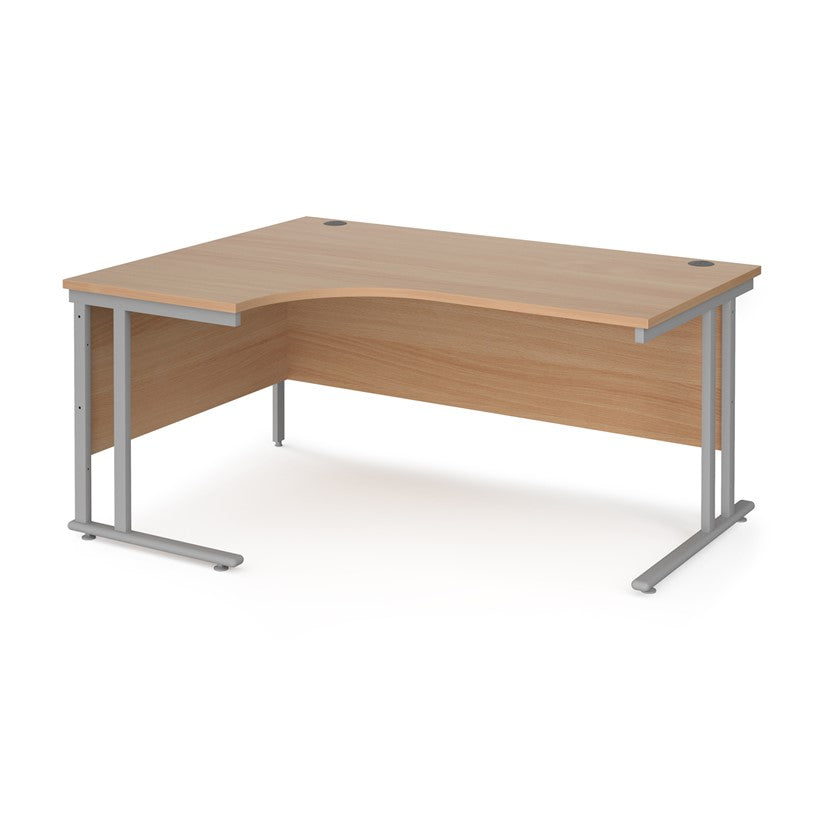 A left hand desk in beech finish with grey legs. 