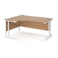 A left hand desk in beech finish with white legs. 