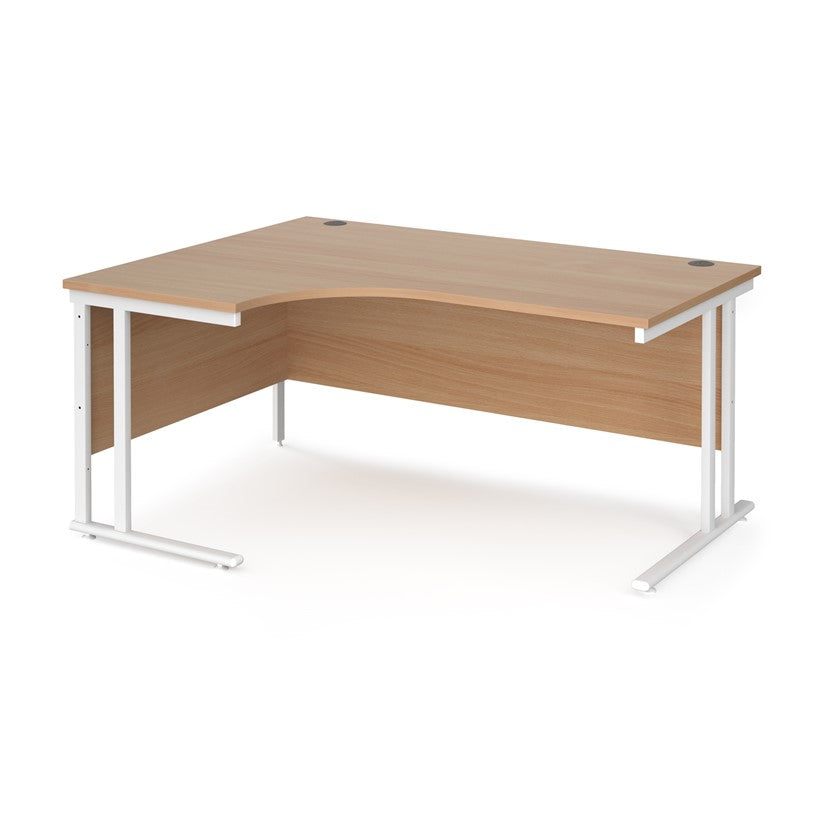 A left hand desk in beech finish with white legs. 