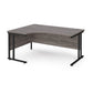 A left hand desk in grey finish with black metal legs. 