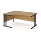 A left hand desk in beech finish with black metal legs. 