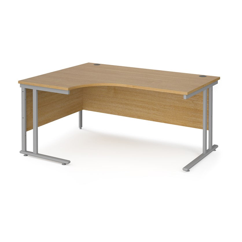 A left hand desk in beech finish with grey metal legs. 