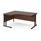 A left hand desk in walnut finish with black metal legs. 