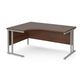 A left hand desk in walnut finish with grey metal legs.
