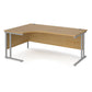 A left hand desk in oak finish with grey metal legs. 
