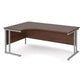 A left hand desk in walnut finish with grey metal legs.