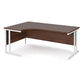 A left hand desk in walnut finish with white metal legs. 