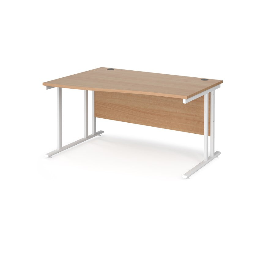 A rectangular office desk with a beige melamine tabletop and cantilever metal legs.