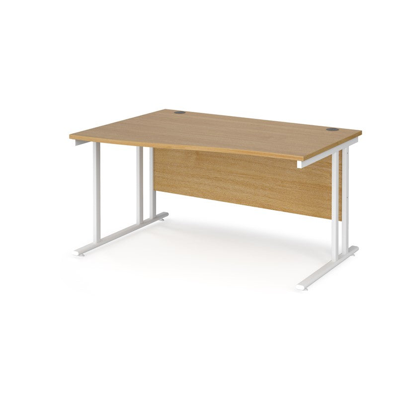 A rectangular office desk with a beige melamine tabletop and cantilever metal legs.