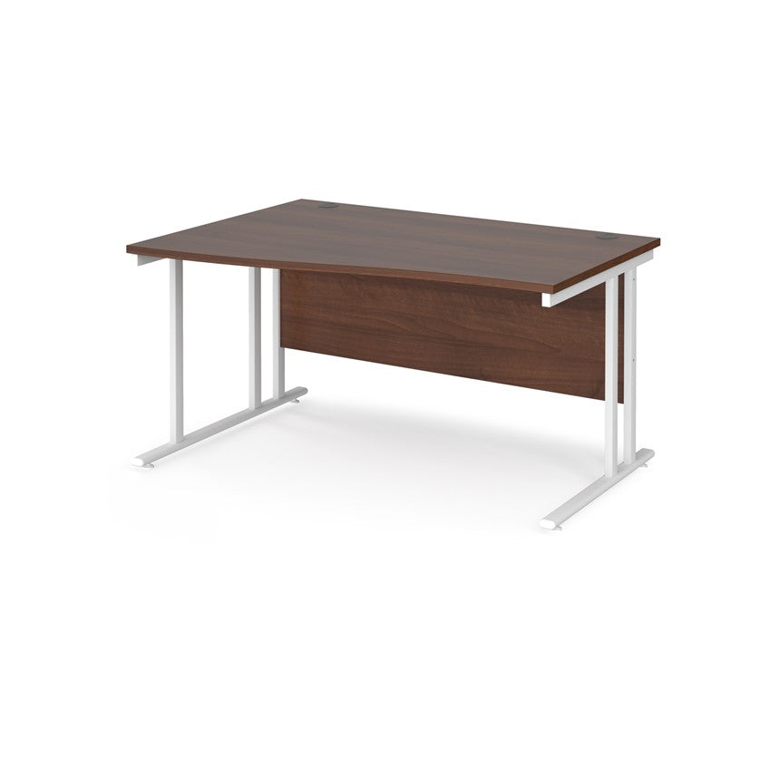 A rectangular office desk with a walnut melamine tabletop and cantilever metal legs.
