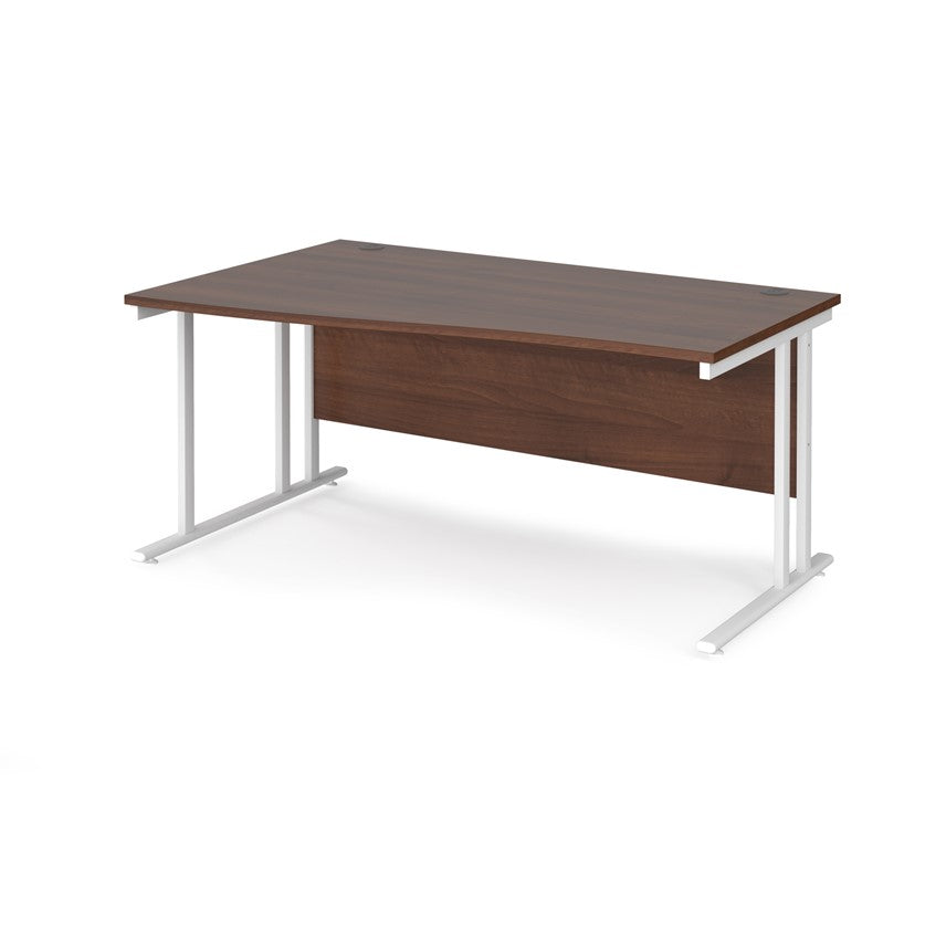 A rectangular office desk with a walnut melamine tabletop and cantilever metal legs.
