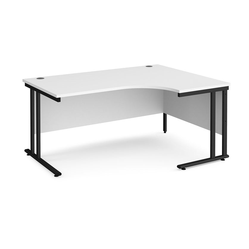 A right-hand ergonomic desk with a white melamine tabletop and black cantilever metal frame.