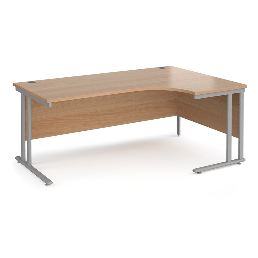 A right-hand ergonomic desk with a beech melamine tabletop and cantilever metal frame.