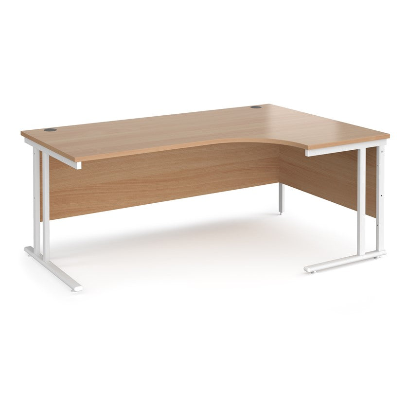 A right-hand ergonomic desk with a beech melamine tabletop and white cantilever metal frame.