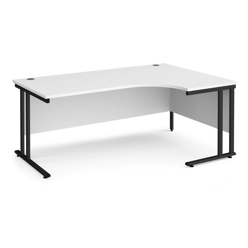 A right-hand ergonomic desk with a white melamine tabletop and black cantilever metal frame.