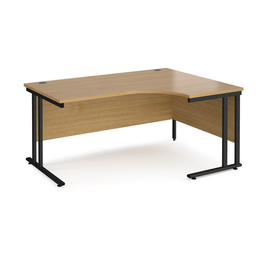 A right-hand ergonomic desk with a beech melamine tabletop and black cantilever metal frame.