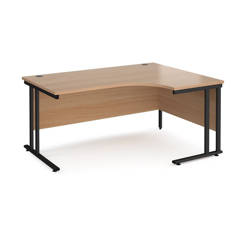 A right-hand ergonomic desk with a beech melamine tabletop and black cantilever metal frame.
