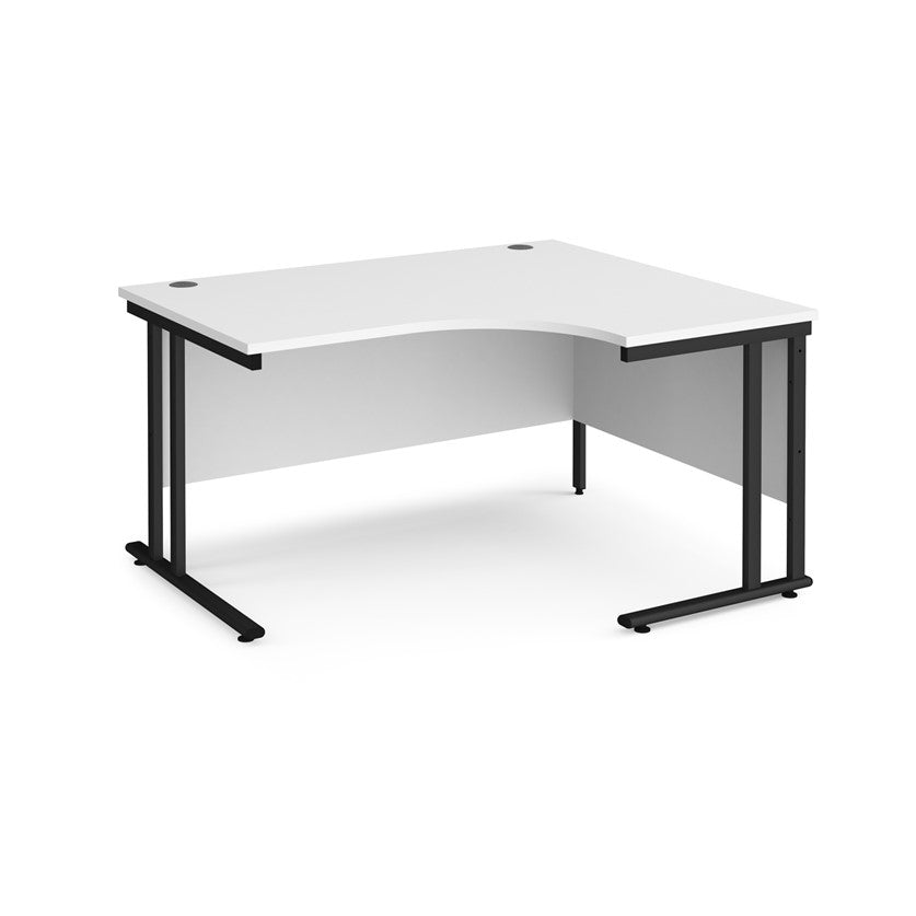 A right-hand ergonomic desk with a white melamine tabletop and black cantilever metal frame.