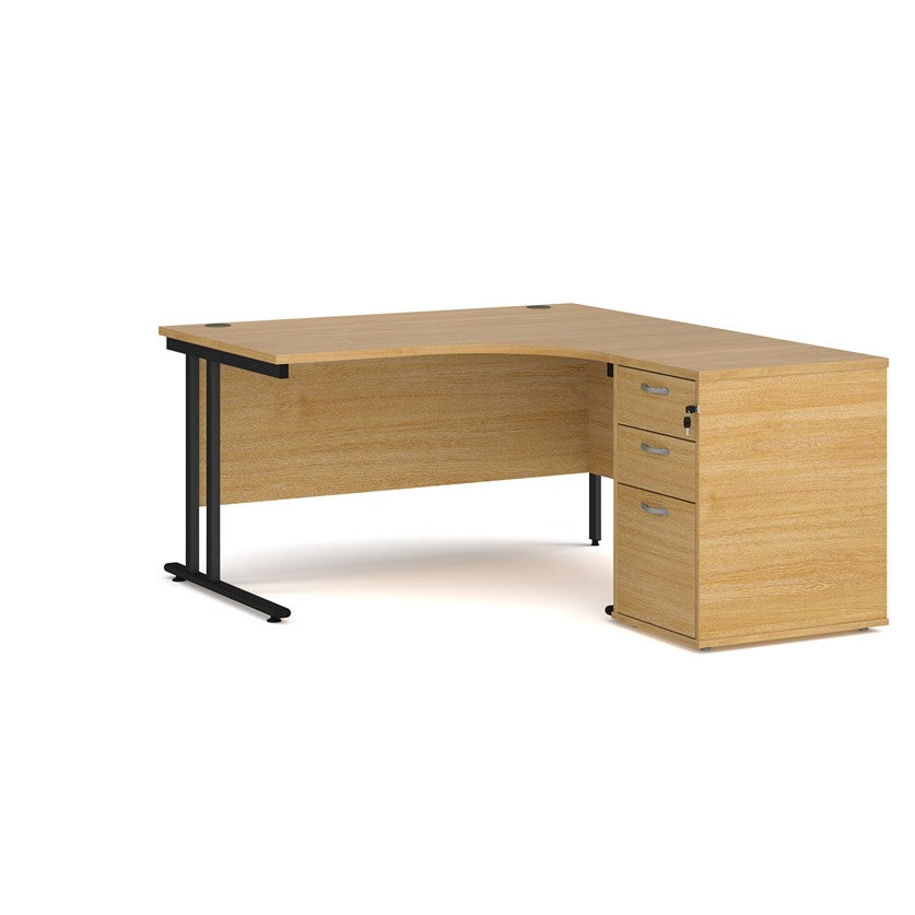 A right-hand configurations office desk with a pedestal storage unit, in a beech wood finish with a cantilever frame.