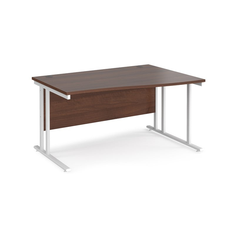 A rectangular office desk with a walnut melamine tabletop and white cantilever metal legs.
