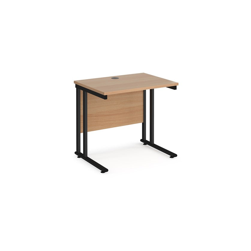 A rectangular office desk with a black cantilever frame and a beige melamine desktop, featuring one cable access port.