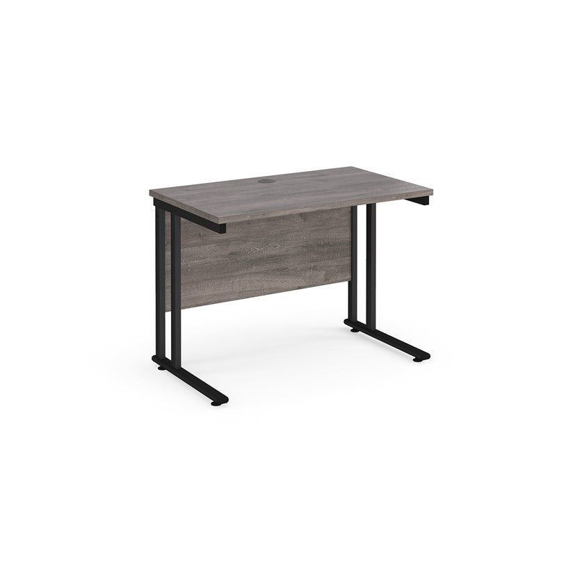 A grey desk with a black cantilever frame.