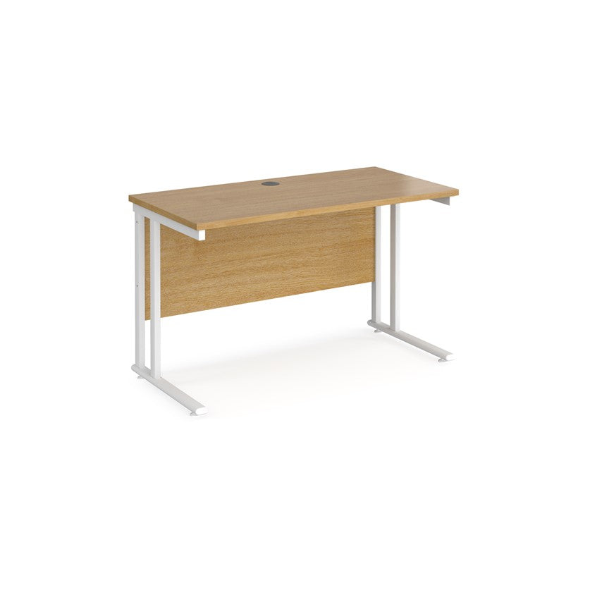 An oak desk with a white cantilever frame.