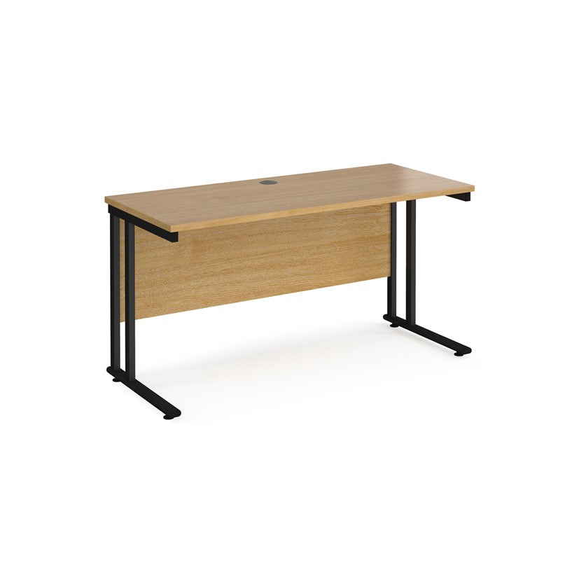 An oak desk with a black cantilever frame.