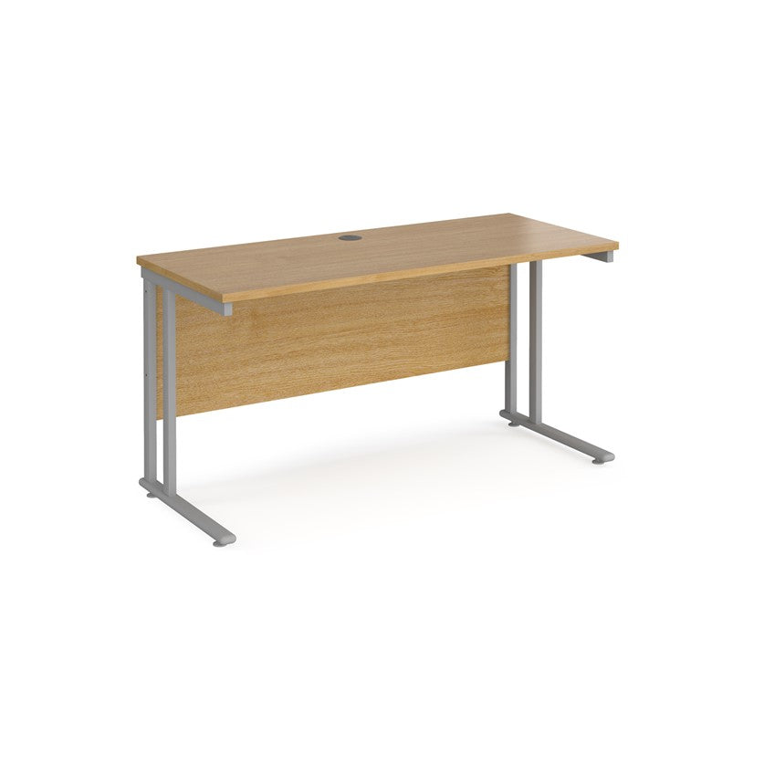 An oak desk with a grey cantilever frame. 
