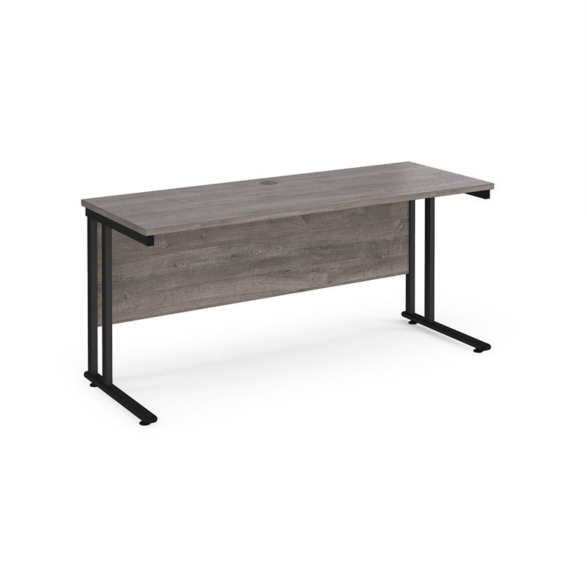 A grey desk with a black cantilever frame.