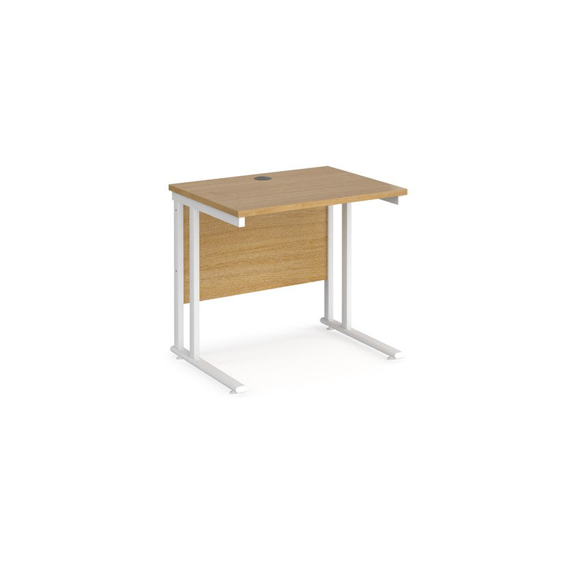 A rectangular office desk with a cantilever frame and a beige melamine desktop, featuring one cable access port.