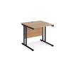 A rectangular office desk with a black cantilever frame and melamine desktop, with one cable access port visible.
