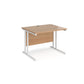 A beech desk with a white cantilever frame.