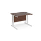 A walnut desk with a white cantilever frame.