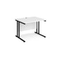 A white desk with a black cantilever frame.