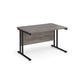 A grey desk with a black cantilever frame.
