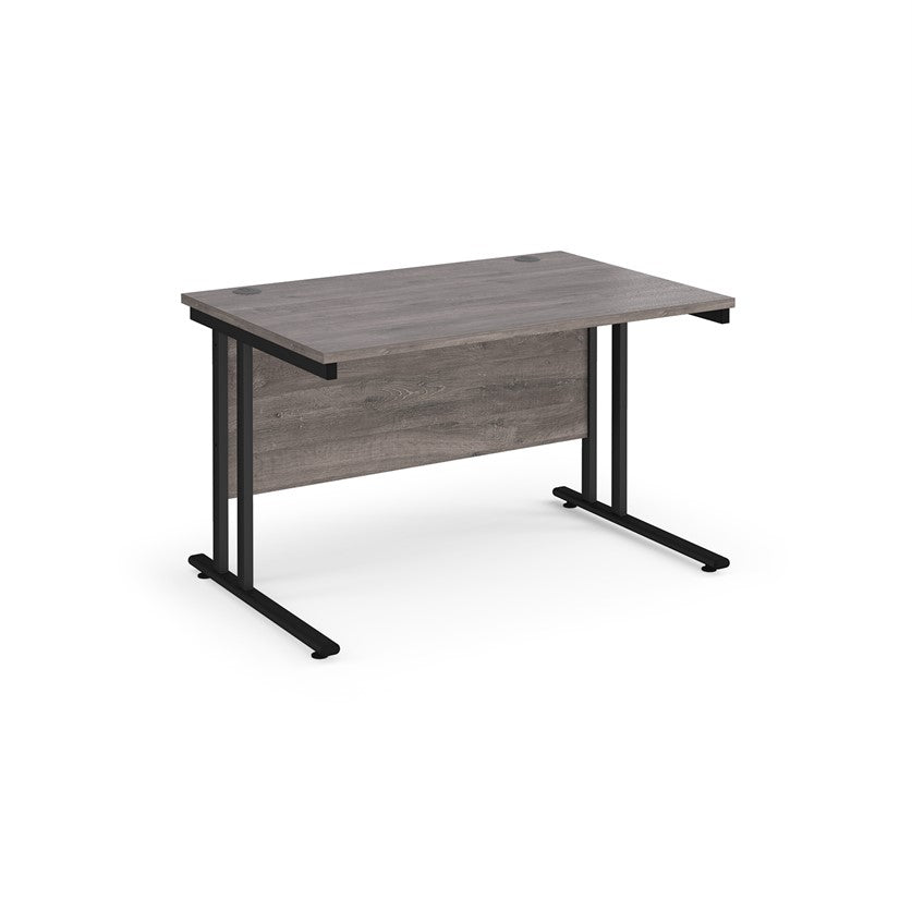 A grey desk with a black cantilever frame.