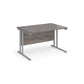 A grey desk with a grey cantilever frame. 