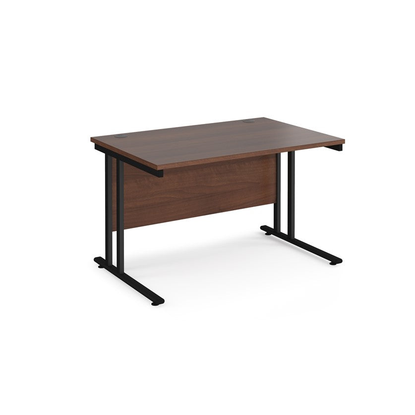 A walnut desk with a black cantilever frame.