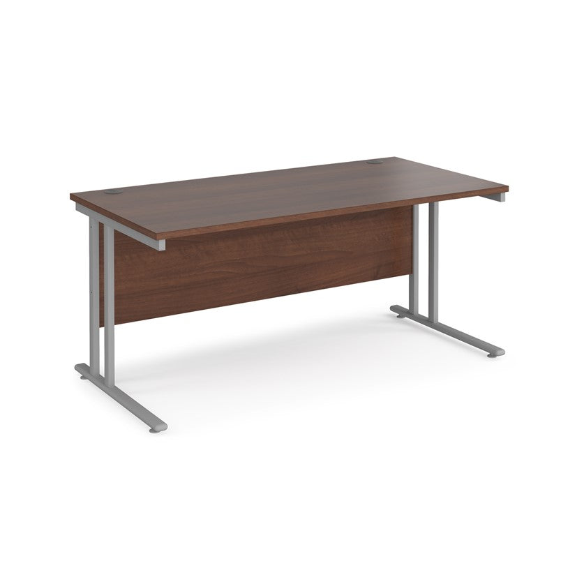 A walnut desk with a grey cantilever frame. 