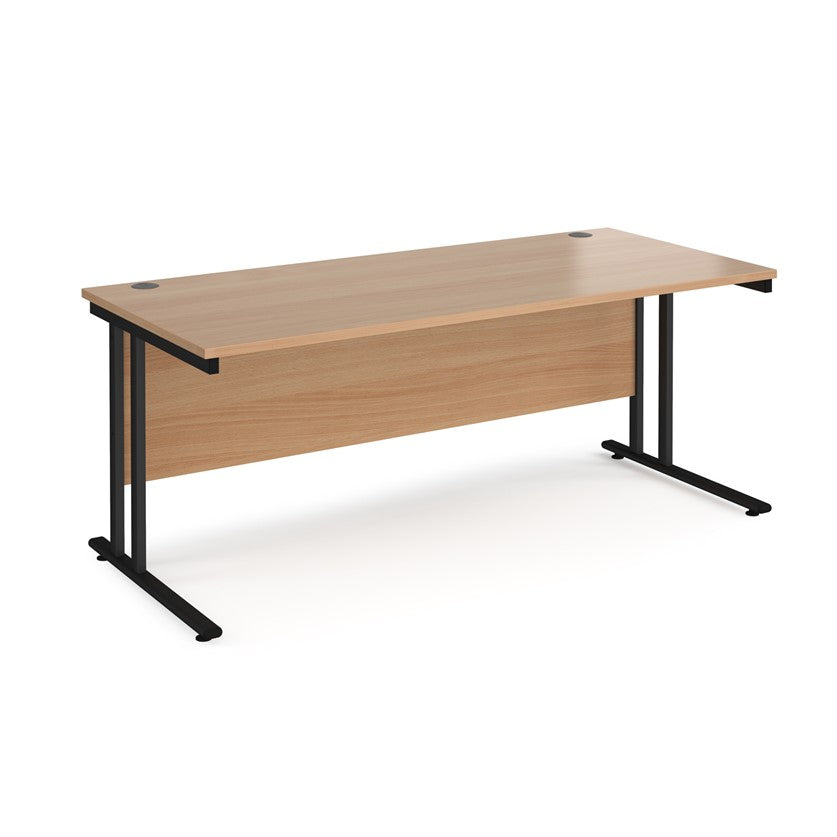 A beech desk with a black cantilever frame. 