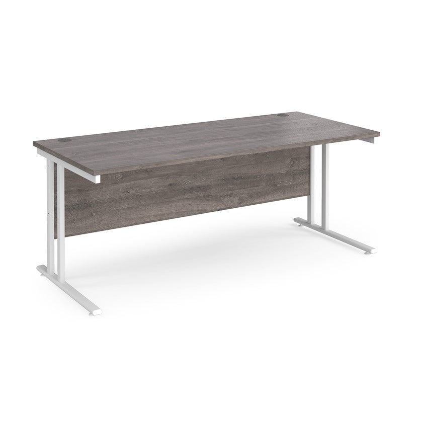 A grey desk with a white cantilever frame.