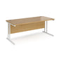 A beech desk with a white cantilever frame.