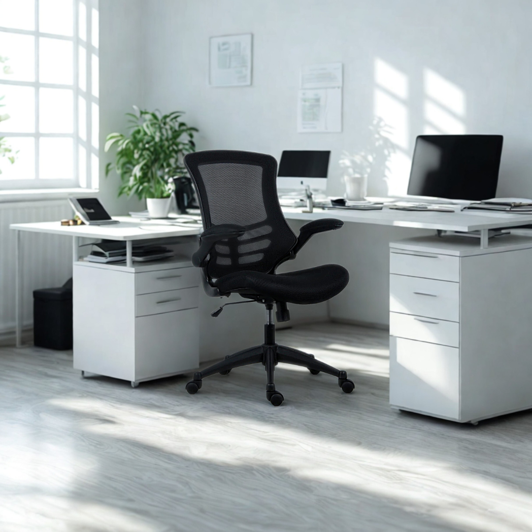 Modern office setup with a white desk, black chair, and computer equipment.