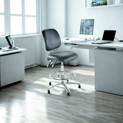 Medium Back Vinyl ESD Draughtsman Chair in an office setting. 